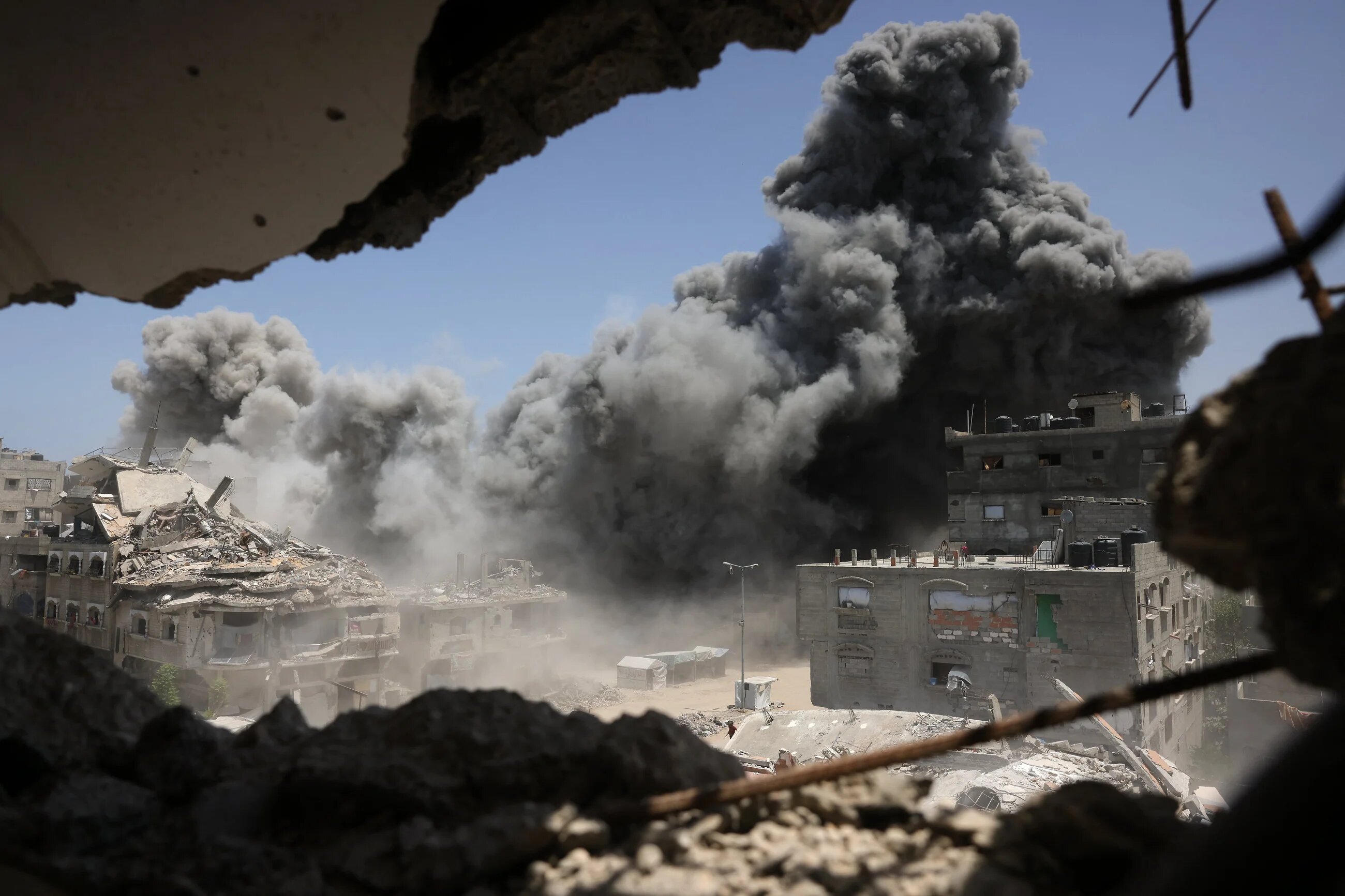Smoke and debris rise following an Israeli strike in Jabalia, north Gaza, on 1 June, 2025 (AFP/Bashar Taleb)