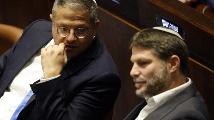 Israeli politicians Itamar Ben-Gvir and Bezalel Smotrich attend a special session of the Knesset in Jerusalem on 29 December 2022 (Amir Cohen/AFP)