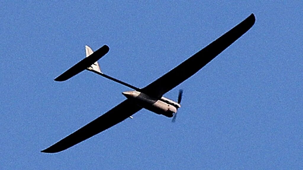 An Israeli drone flies over northern Gaza on 27 December 2023 (Jack Guez/AFP)