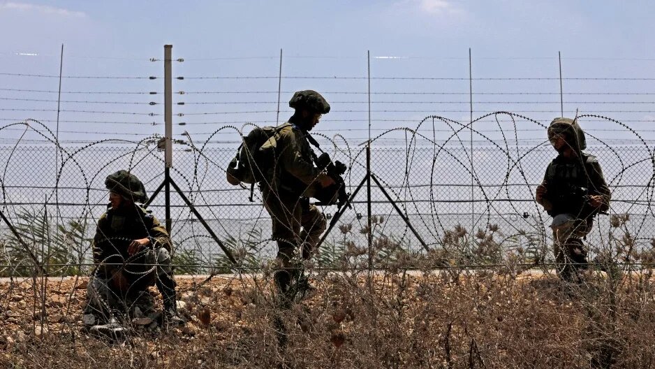 Israeli forces patrol the occupied West Bank in September 2021 (Jalaa Marey/AFP)