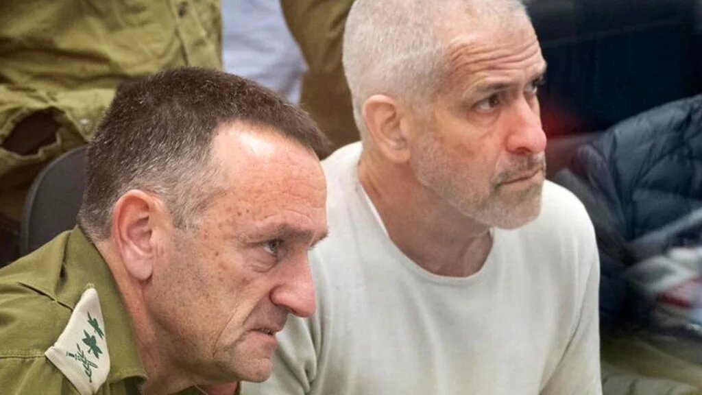 Herzi Halevi, then Israel’s army chief, is pictured next to Shin Bet director Ronen Bar on 25 January 2025 (Israeli Army/AFP)