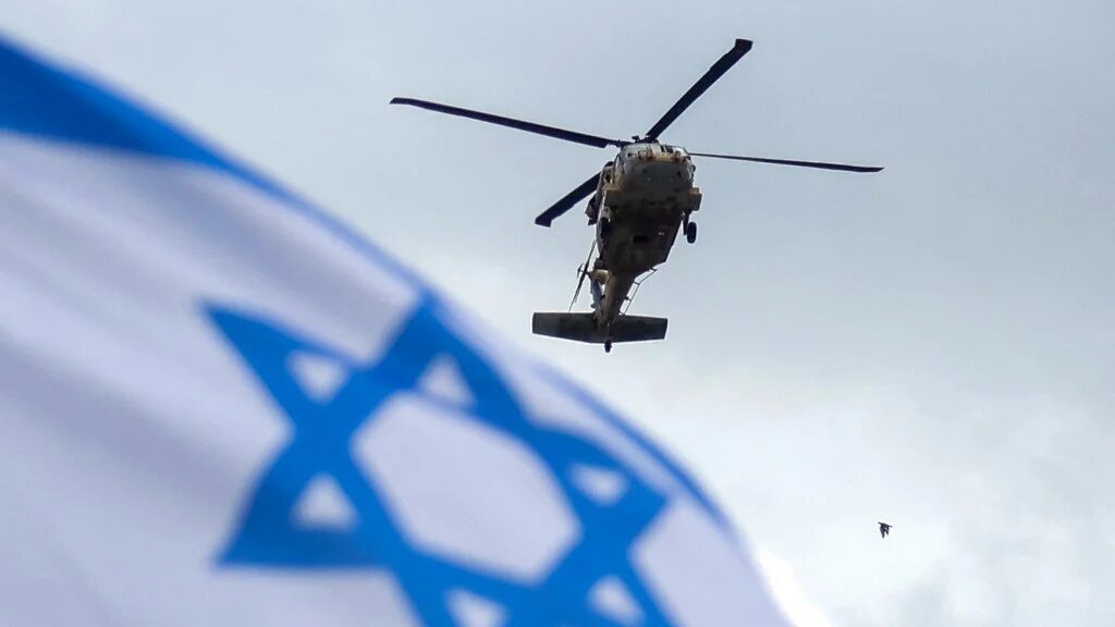 A military helicopter carrying a released Israeli hostage arrives at a hospital in Petah Tikva on 22 February 2025 (Ahmad Gharabli/AFP)