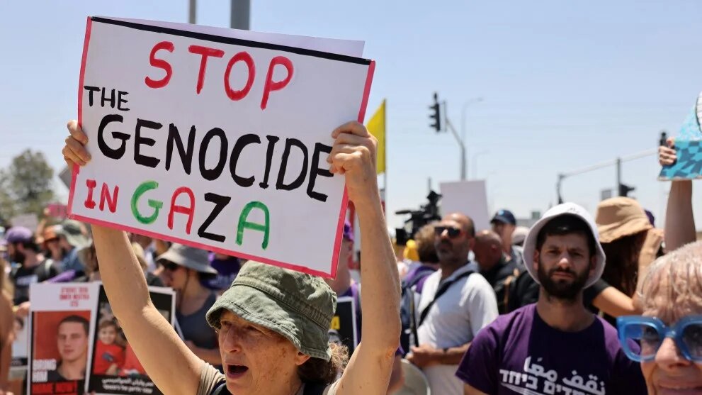 Israeli activists take part in an anti-government demonstration near Sderot on 23 May 2025 (Ahmad Gharabli/AFP)