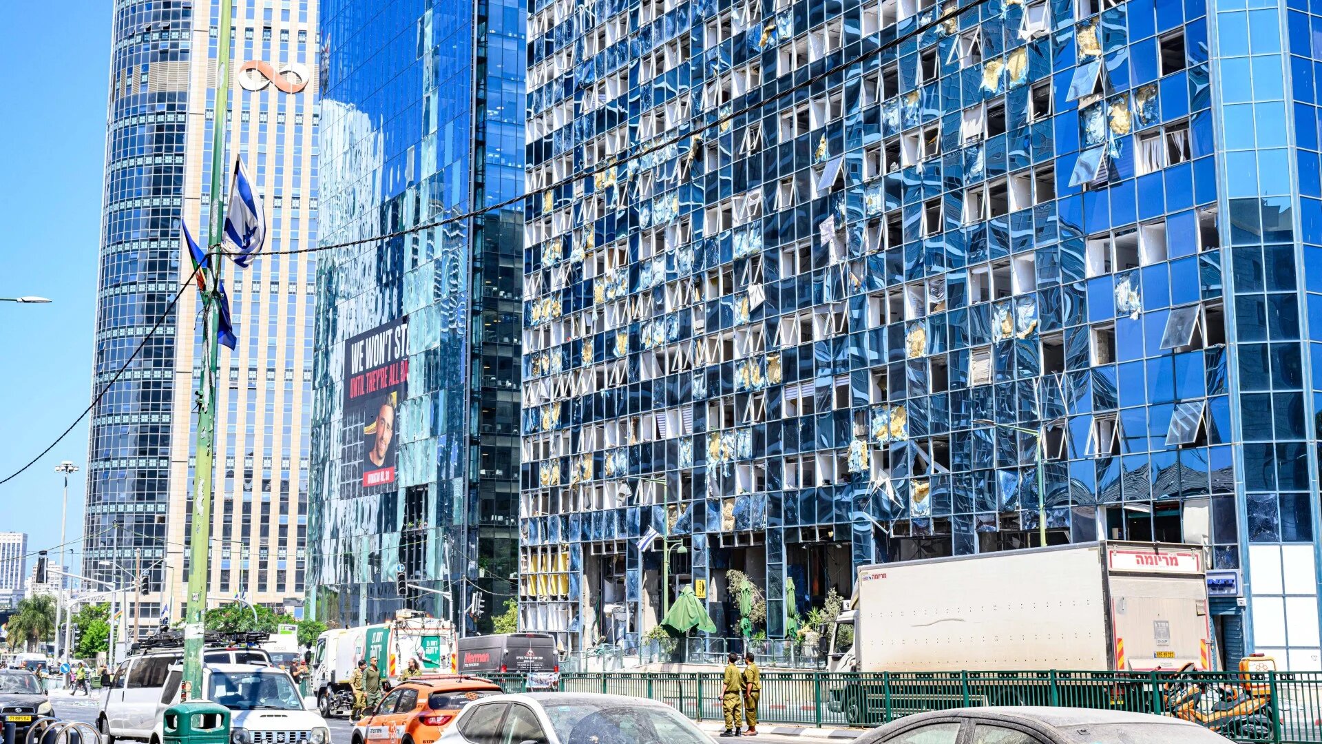 This image shows an office building in Ramat Gan, a district of Tel Aviv, damaged by a missile fired by Iran on 19 June 2025 (Israel Hadari/ZUMA Press Wire via Reuters)