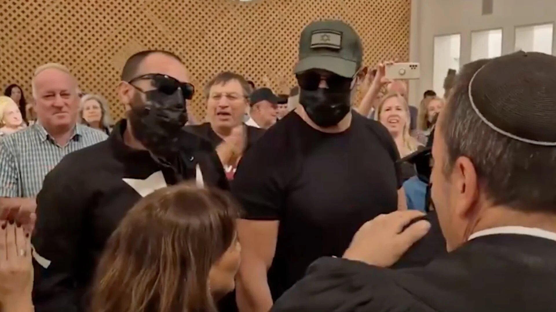 Two of five Israeli soldiers accused of raping a Palestinian prisoner met with cheers during a court hearing in Jerusalem on 10 November 2025 (X/Screengrab)