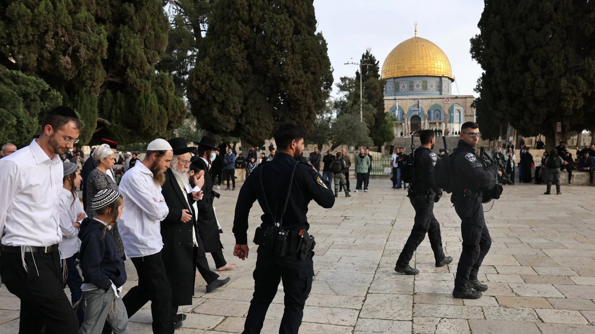 Israelis storm the Al-Aqsa Mosque compound under the protection of Israeli security forces on 9 April 2023 during the Jewish Passover holiday (Ahmad Gharabli/AFP)