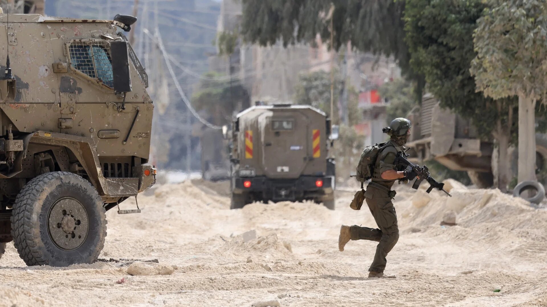 Israeli soldiers conducted a raid on the Nur Shams refugee camp near Tulkarem in the occupied West Bank on 28 August 2024 (AFP/Jaafar Ashtiyeh)