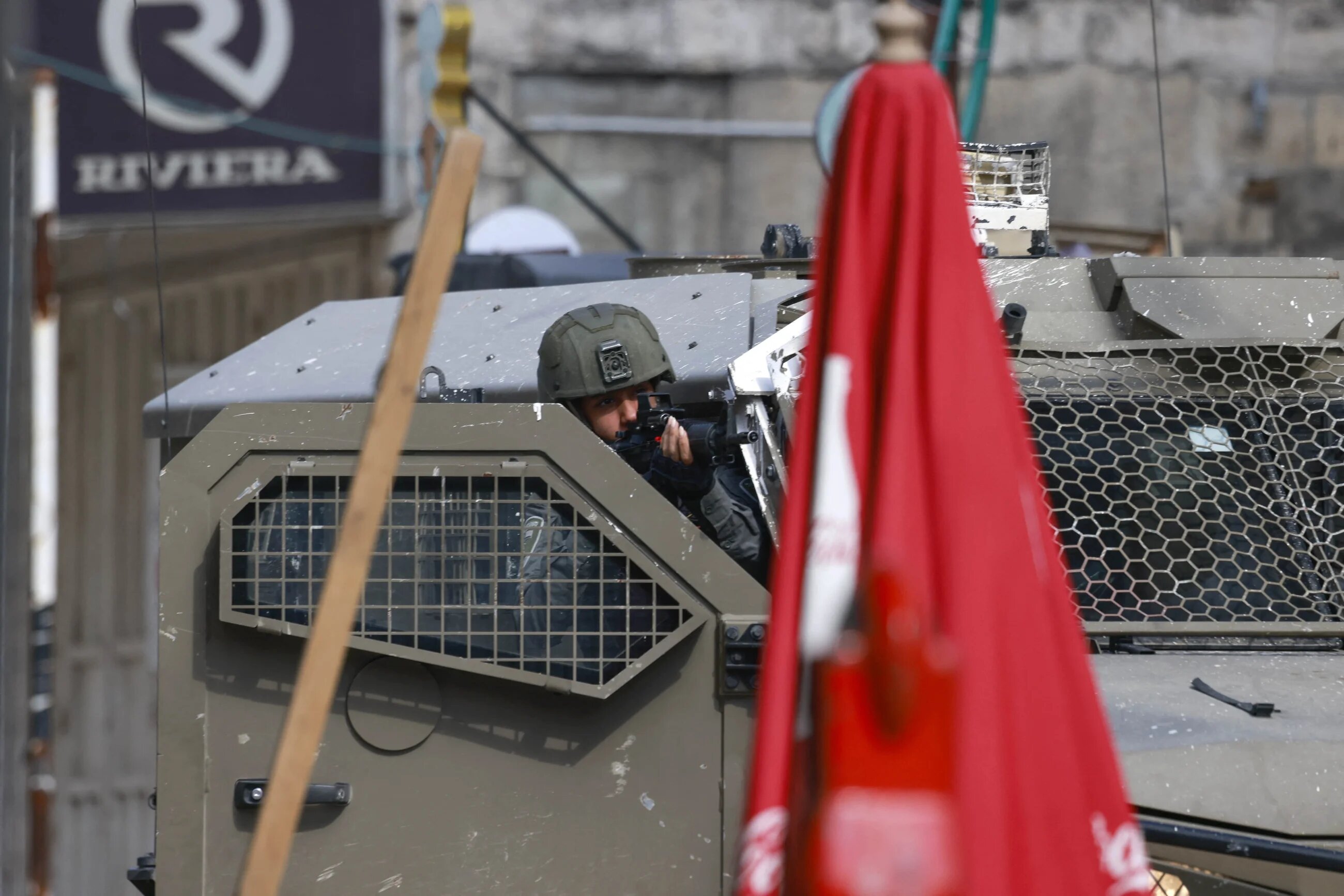 An Israeli soldier is pictured during a raid in Tulkarm in the occupied West Bank on 28 January, 2025 (AFP/Jaafar Ashtiyeh) 