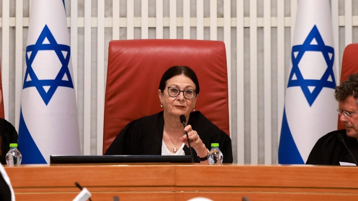 President of the Israeli Supreme Court Esther Hayut and judges assemble to hear petitions at the court premises in Jerusalem on 28 September 2023.