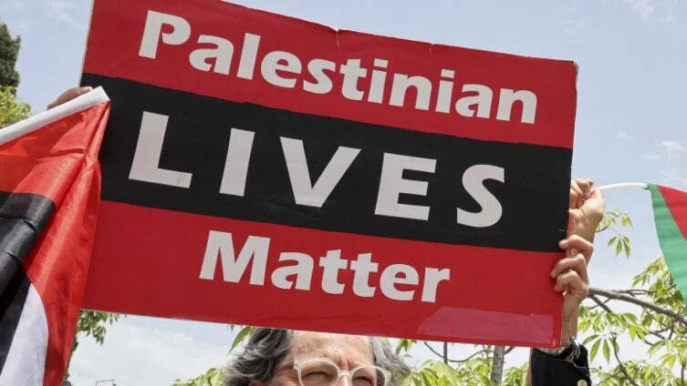 Activists take part in a protest in Tel Aviv on 28 May 2023 (Jack Guez/AFP)