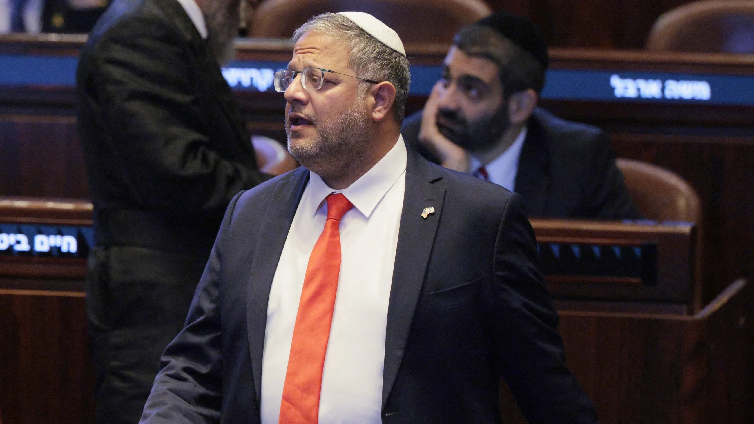 Israel's National Security Minister Itamar Ben Gvir stands at the Knesset, Israeli parliament, ahead of an address by US president Donald Trump in Jerusalem on 13 October, 2025 (AFP/Chip Somodevilla)