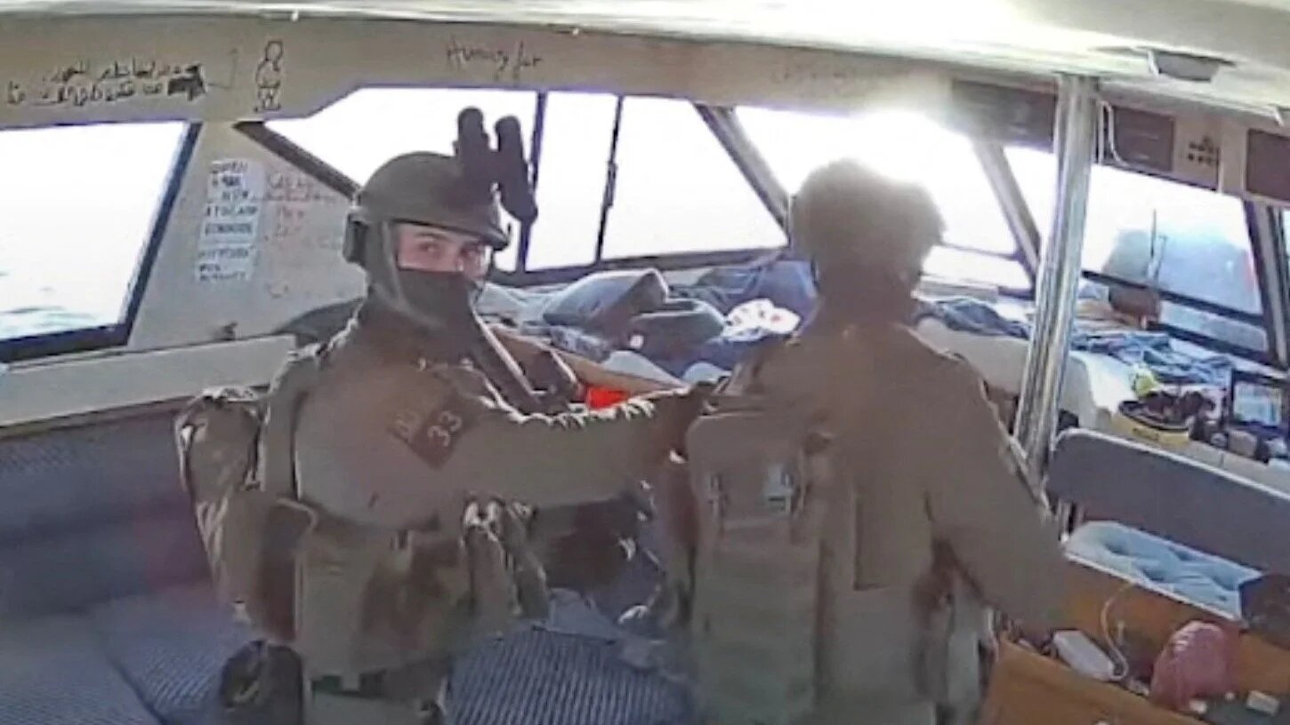 A screengrab from a live stream video shows Israeli navy forces aboard the Gaza-bound vessel Captain Nikos, part of the Global Sumud Flotilla, which was intercepted on 2 October 2025 (Global Sumud Flotilla/Handout/Reuters)