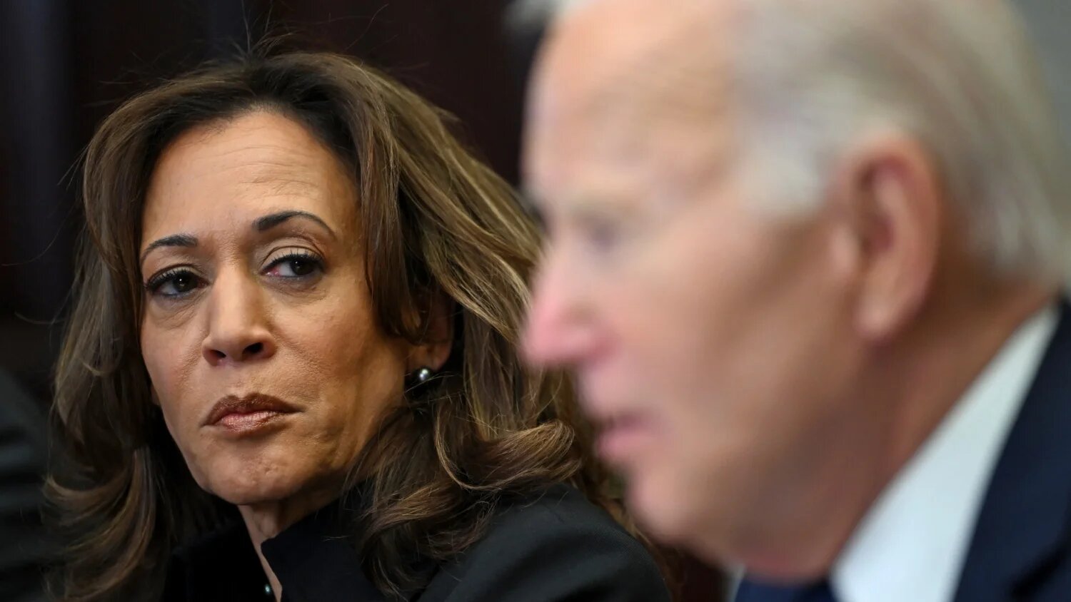 US Vice President Kamala Harris listens to US President Joe Biden speak about the Los Angeles fires in the Roosevelt Room of the White House in Washington, DC, on 9 January 2025.