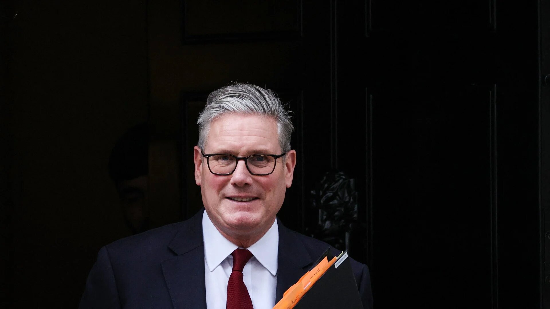 Britain's Prime Minister Keir Starmer leaves 10 Downing street, in central London, on 21 July 2025 (AFP/Adrian Dennis)