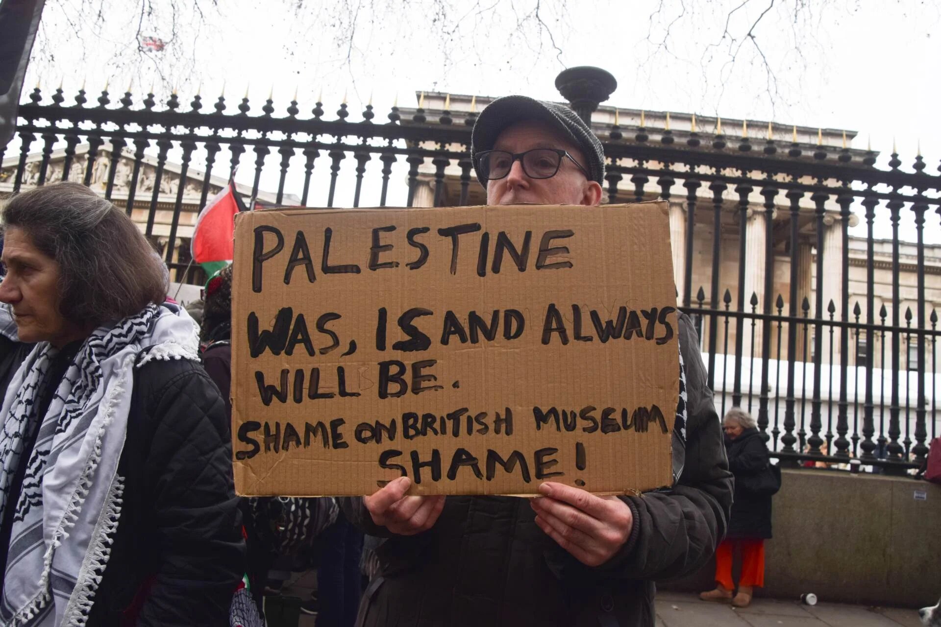 Demonstrator holds a sign at a British Museum protestFebruary 2026 