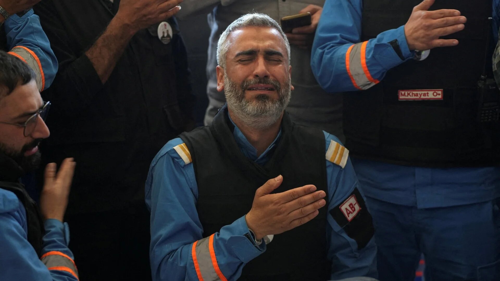 Colleagues of paramedic Mahdi Abu Zaid, who was killed in an Israeli strike, mourn during his funeral in Nabatieh, Lebanon, 16 April 2026 (Reuters)