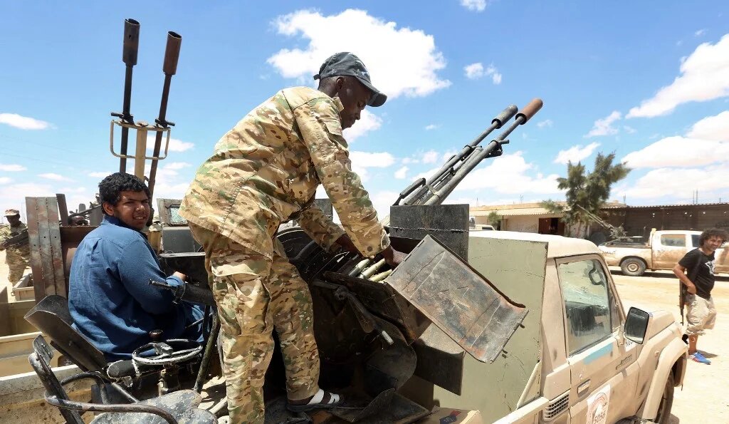 Fighters loyal to the Government of National Accord GNA secure the area of Abu Qurain against forces loyal to Khalifa Haftar on 20 July 2020.