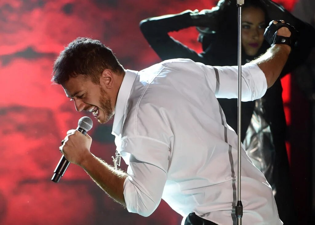 Après le verdict rendu par les assises de Paris le vendredi 24 février, le chanteur a fait appel de sa condamnation. Il a toutefois été incarcéré (AFP/Fethi Belaid)