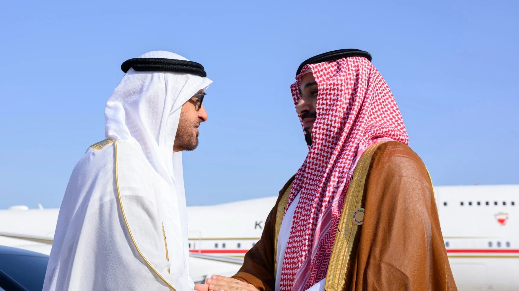 This handout image provided by the UAE Ministry Of Presidential Affairs, shows Saudi Crown Prince Mohammed bin Salman (R) bidding UAE President Sheikh Mohamed bin Zayed Al Nahyan farewell, as he departs from King Abdulaziz International Airport on July 16, 2022, after attending the Jeddah Security and Development Summit (GCC+3) in the Saudi city of Jeddah. UAE's Ministry of Presidential Affairs / AFP