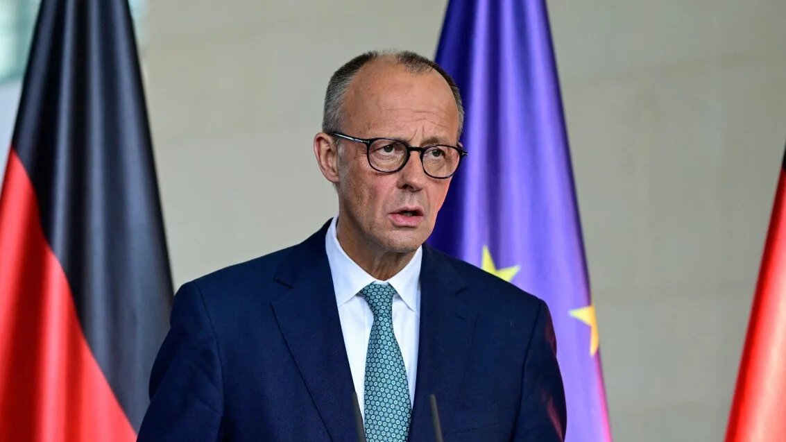 German Chancellor Friedrich Merz leaves after making a statement to journalists following a meeting of the security Cabinet of the German government at the Chancellery in Berlin on 28 July 2025 (AFP)