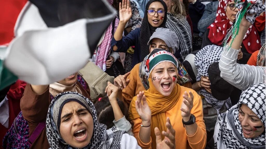 Demonstrators march in Rabat to express support to Palestinians on 15 October 2023 (AFP)