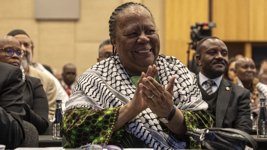 Naledi Pandor, South Africa's then minister of international relations and cooperation, applauds a speech at the first Global Anti-Apartheid Conference in Johannesburg, on 10 May 2024 (Emmanuel Croset/AFP)