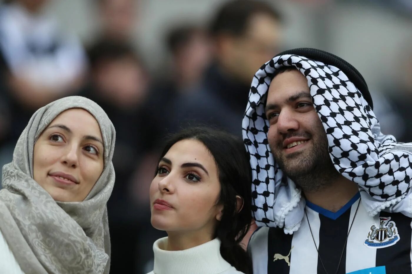 Football fans posing for photo ahead of a match