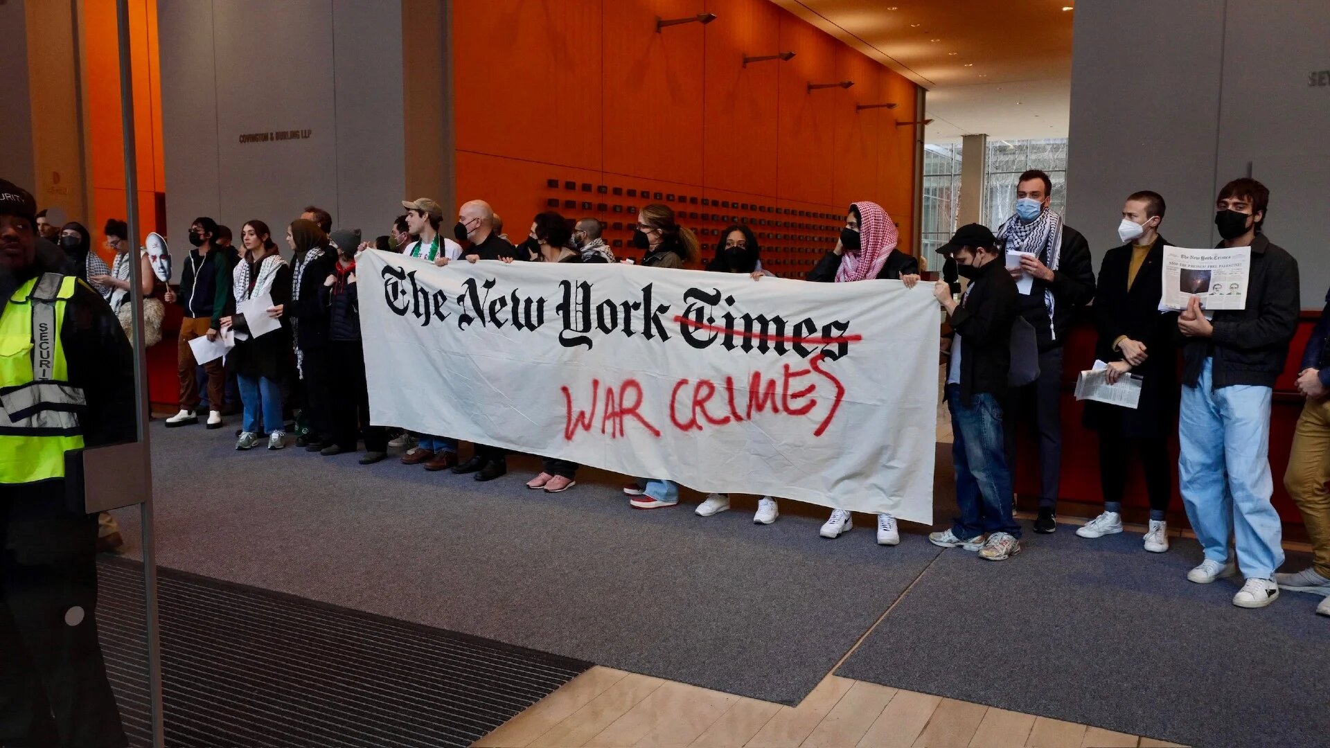 Activists protest in the lobby of the New York Times in March 2024 (Writers Against the War on Gaza) 