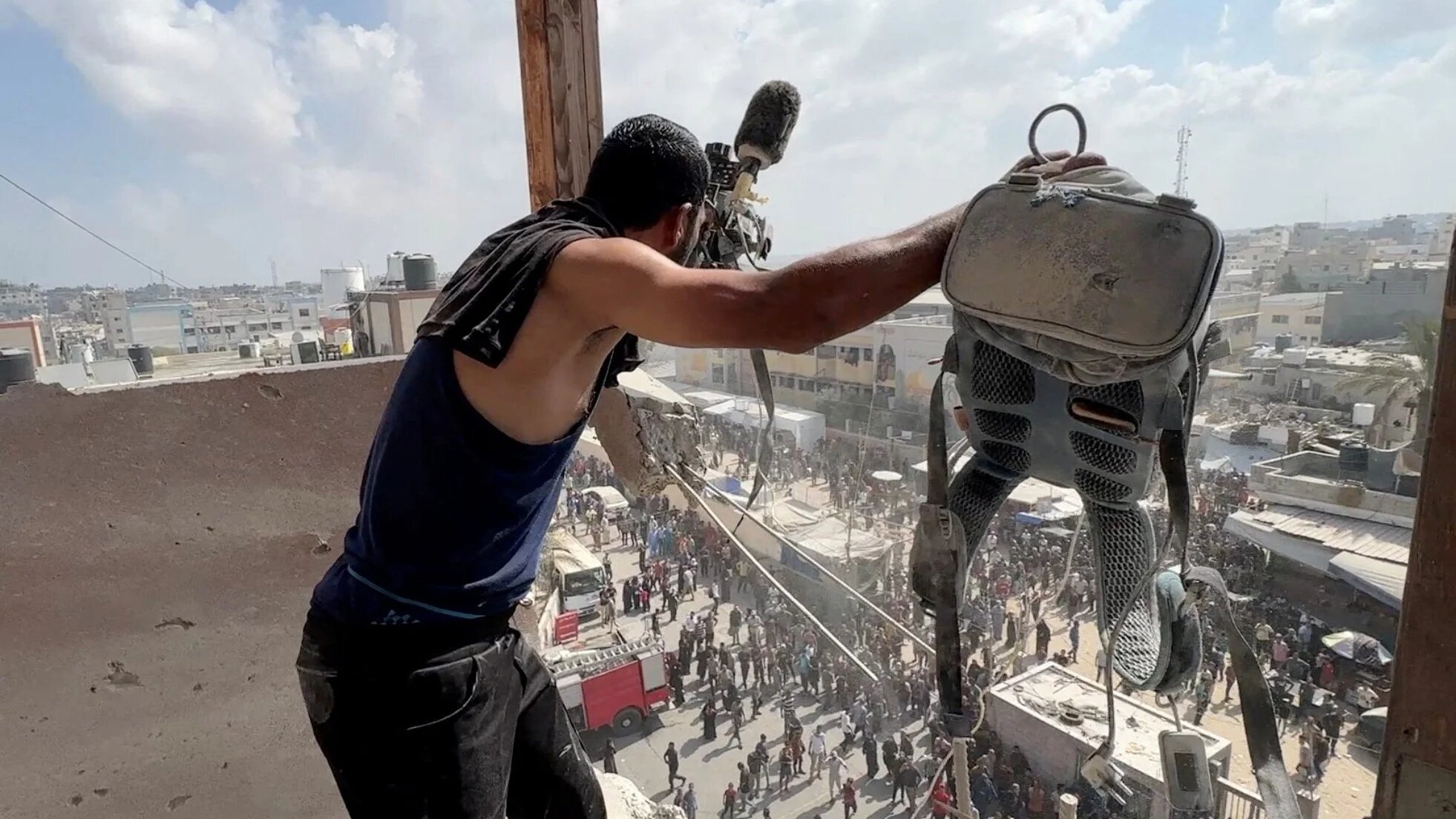 A man holds the equipment used by Palestinian cameraman Hussam al-Masri who was killed along with other journalists at the Nasser hospital, in Khan Younis, in the southern Gaza Strip on 25 August 2025 (Reuters/Hatem Khaled)