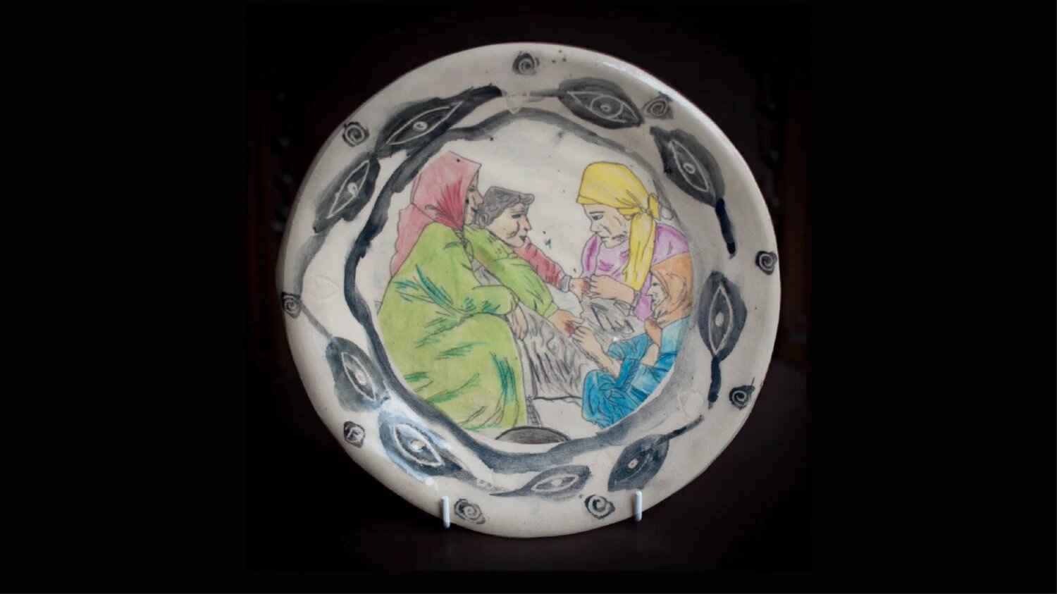 The artwork was created by Palestinian children in Gaza, then transferred to plates by children in the UK (Chelsea Community Hospital School)