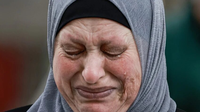 A mother of Palestinian prisoners weeps during a rally against the new death-penalty law, in the occupied West Bank city of Nablus, on 31 March 2026 (Jaafar Ashtiyeh/AFP)