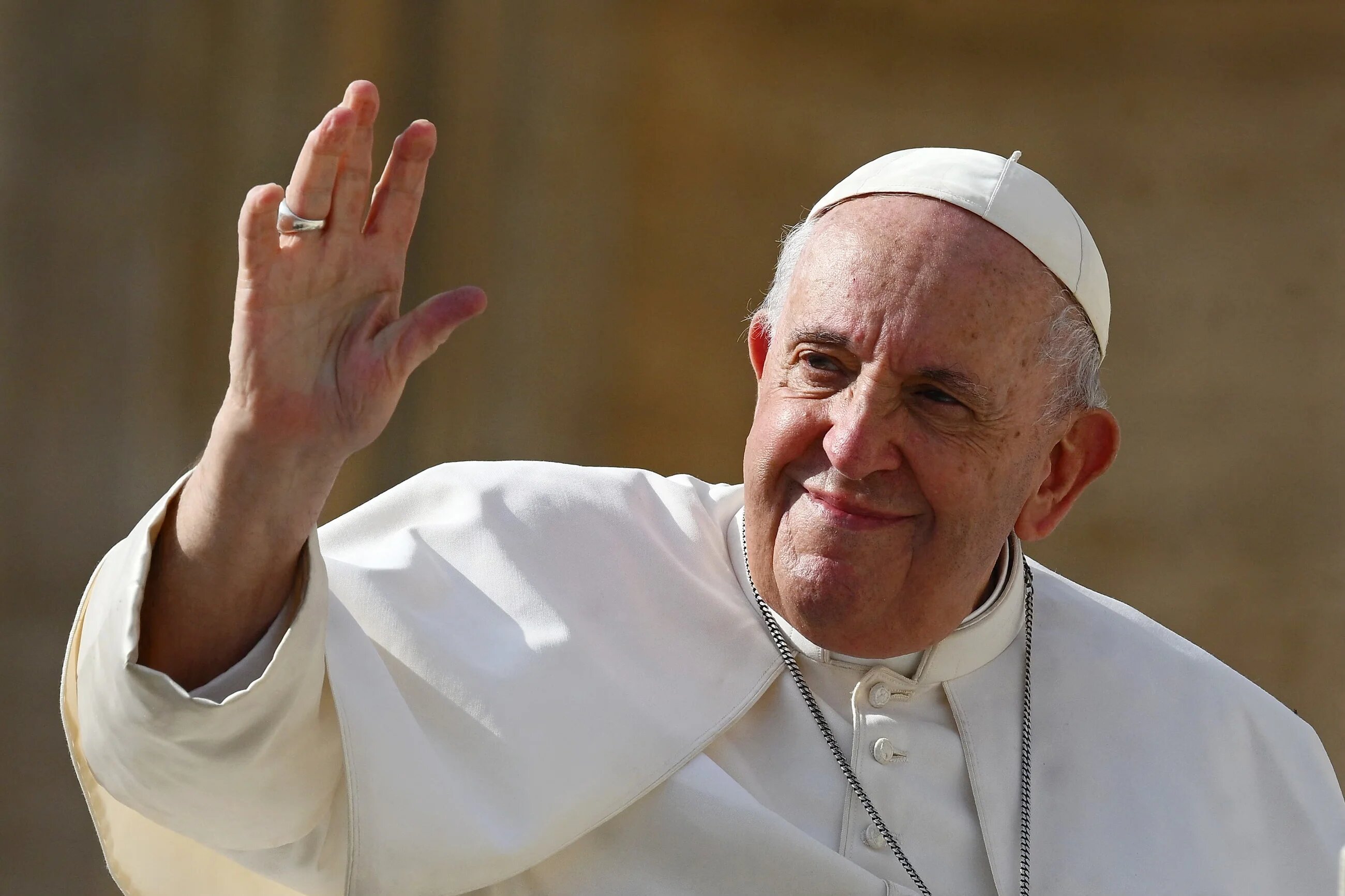Pope Francis waves at to crowds at Saint Peter's Square in the Vatican on 26 October, 2022 (AFP/Vincenzo Pinto)