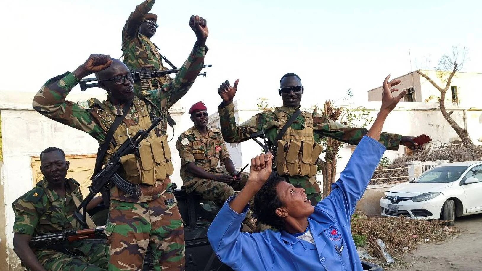 Sudanese citizens celebrate following an announcement by the army that it took over the city of Wad Madani in Port Sudan, Sudan on 11 January 2025.