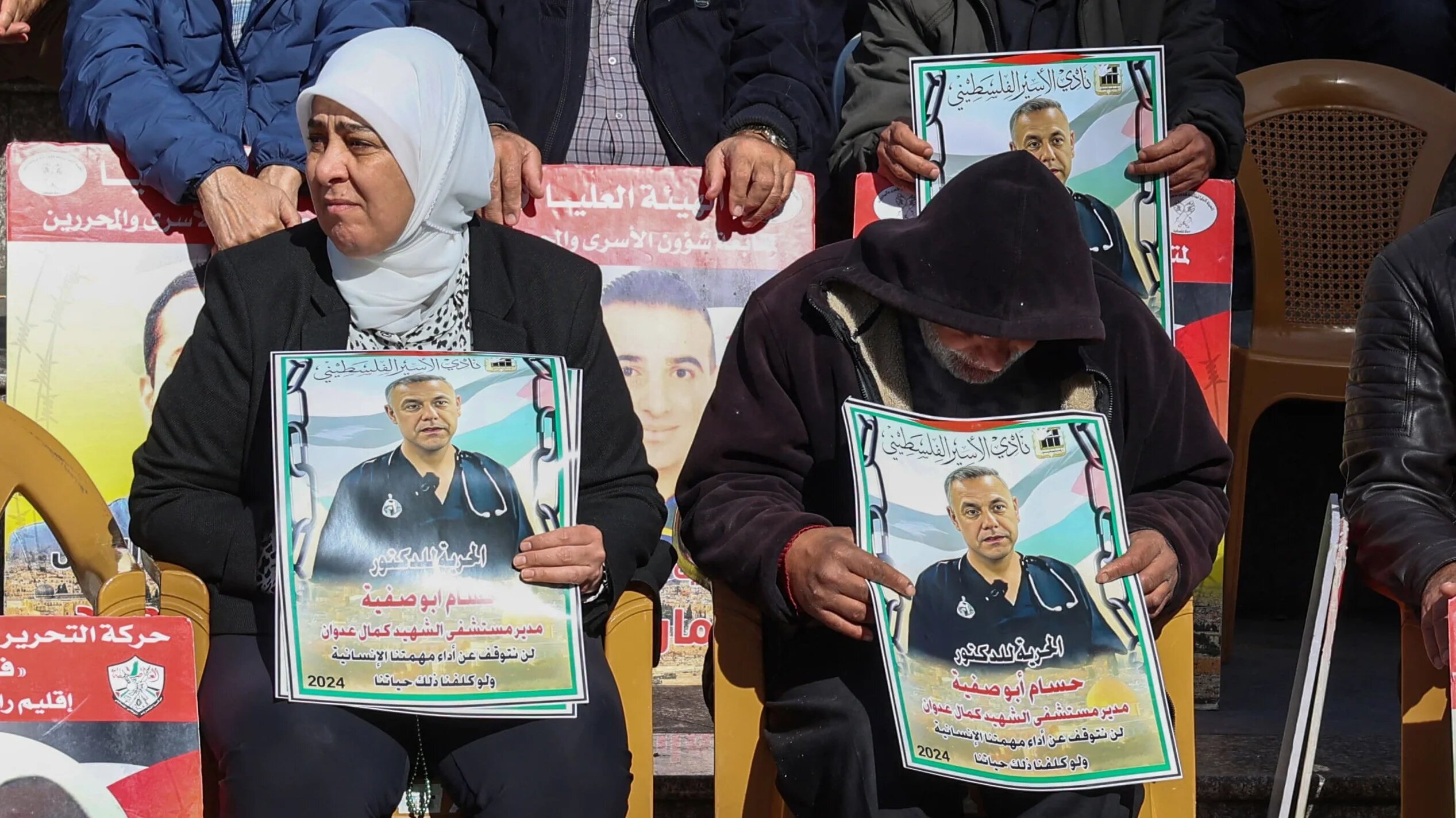 Protest in solidarity with Palestinians detained by Israel, including the director of the Kamal Adwan Hospital in Gaza Hussam Abu Safiya, in Ramallah, occupied West Bank, on 14 January, 2025 (AFP/Zain Jaafar)