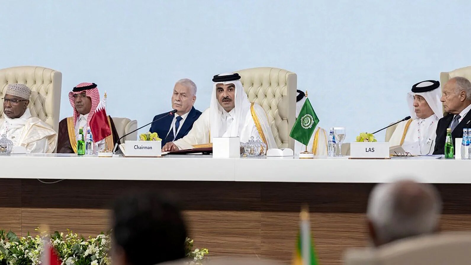 Qatar's Emir Tamim bin Hamad Al Thani (centre) chairs the Arab-Islamic emergency summit in Doha on 15 September 2025 (Qatar News Agency/AFP)
