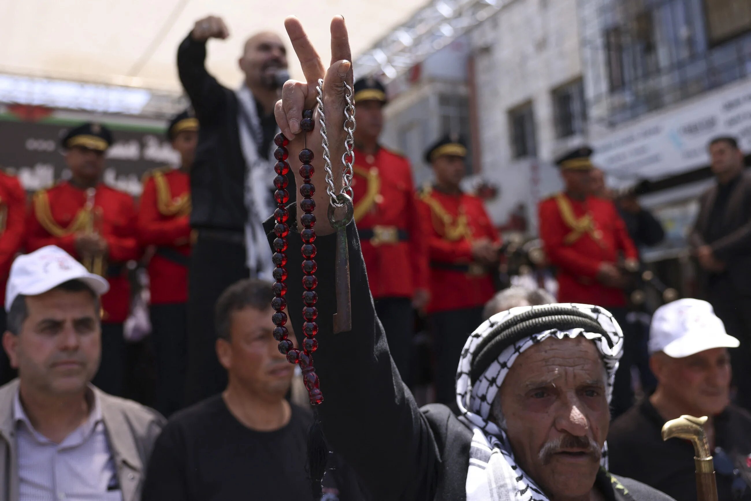 A protester holds a key symbolising the homes of Palestinians who were forcibly expelled in 1948 during a rally marking Nakba day in Ramallah, occupied West Bank, on 15 May, 2023 (AFP/Hazem Bader)