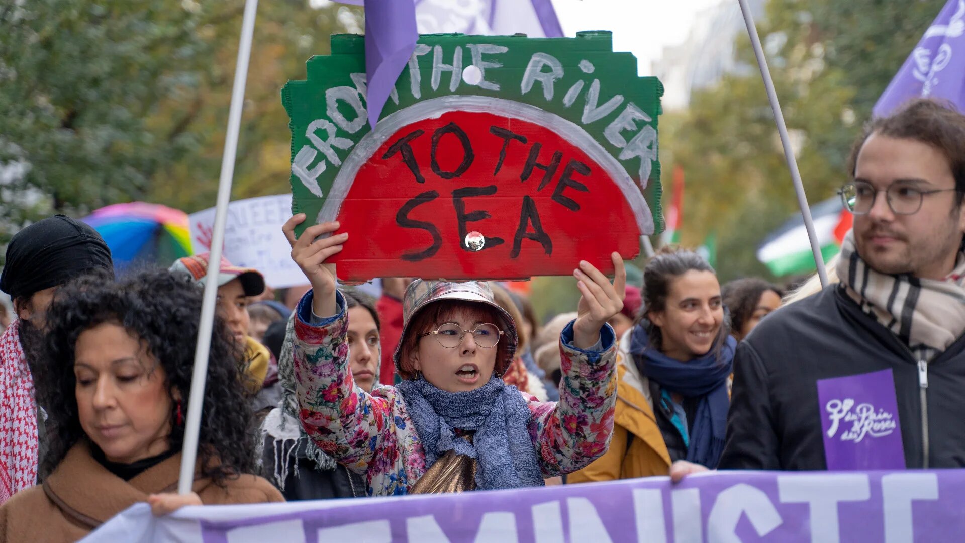 Protesters march in solidarity with the Palestinian cause and for an immediate ceasefire in Gaza in Paris, France, on 11 November 2023 (Reuters)