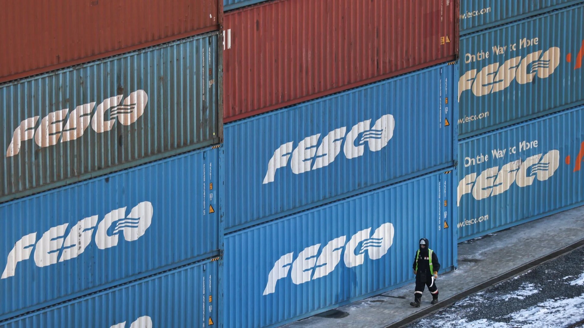 Shipping containers are stored at a commercial port in Vladivostok, Russia, 14 February (Reuters/Tatiana Meel)