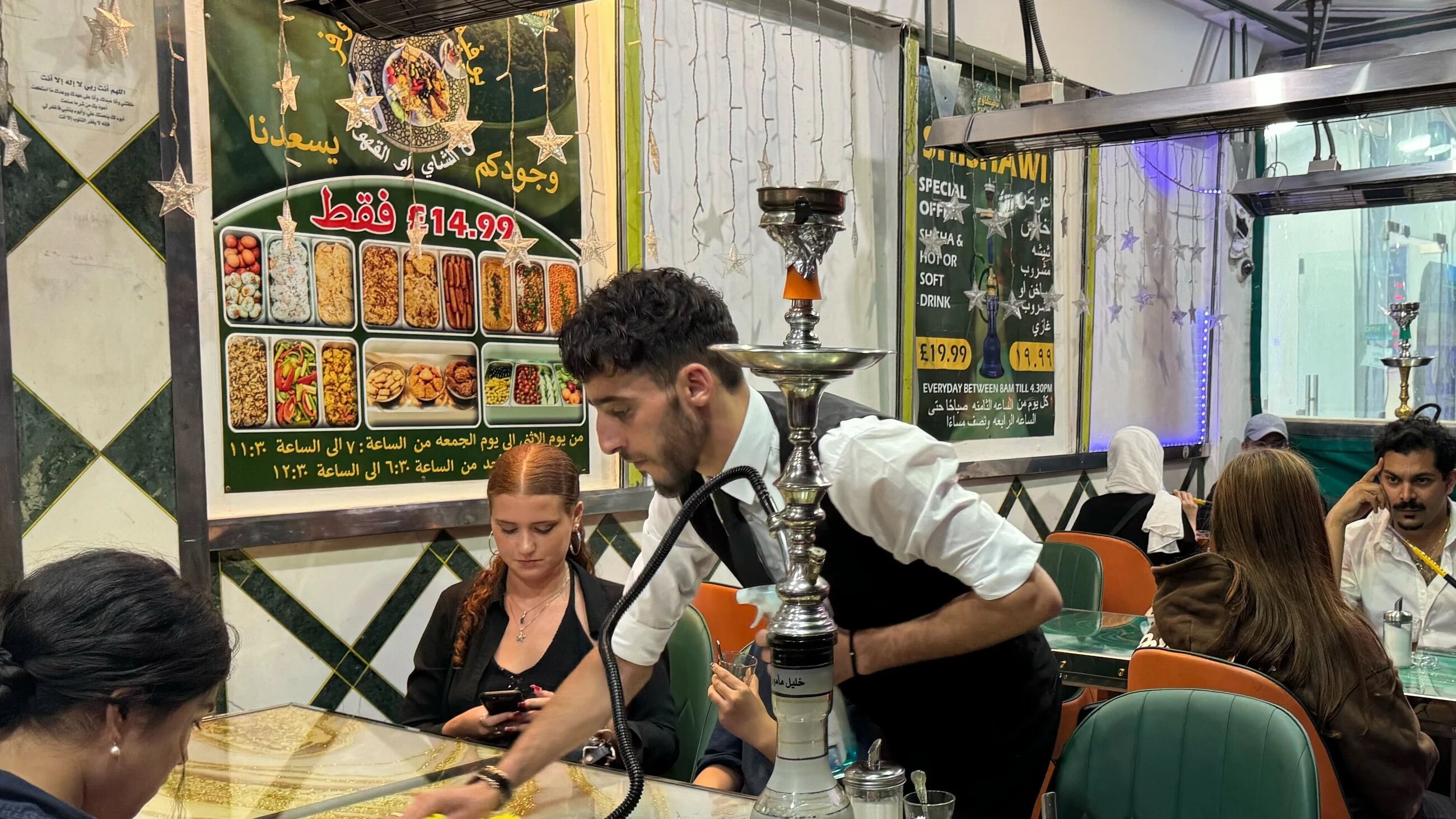 Elma and Zohal, recent university graduates, come to Shishawi for a relaxing evening out (MEE/Mohammad Saleh)