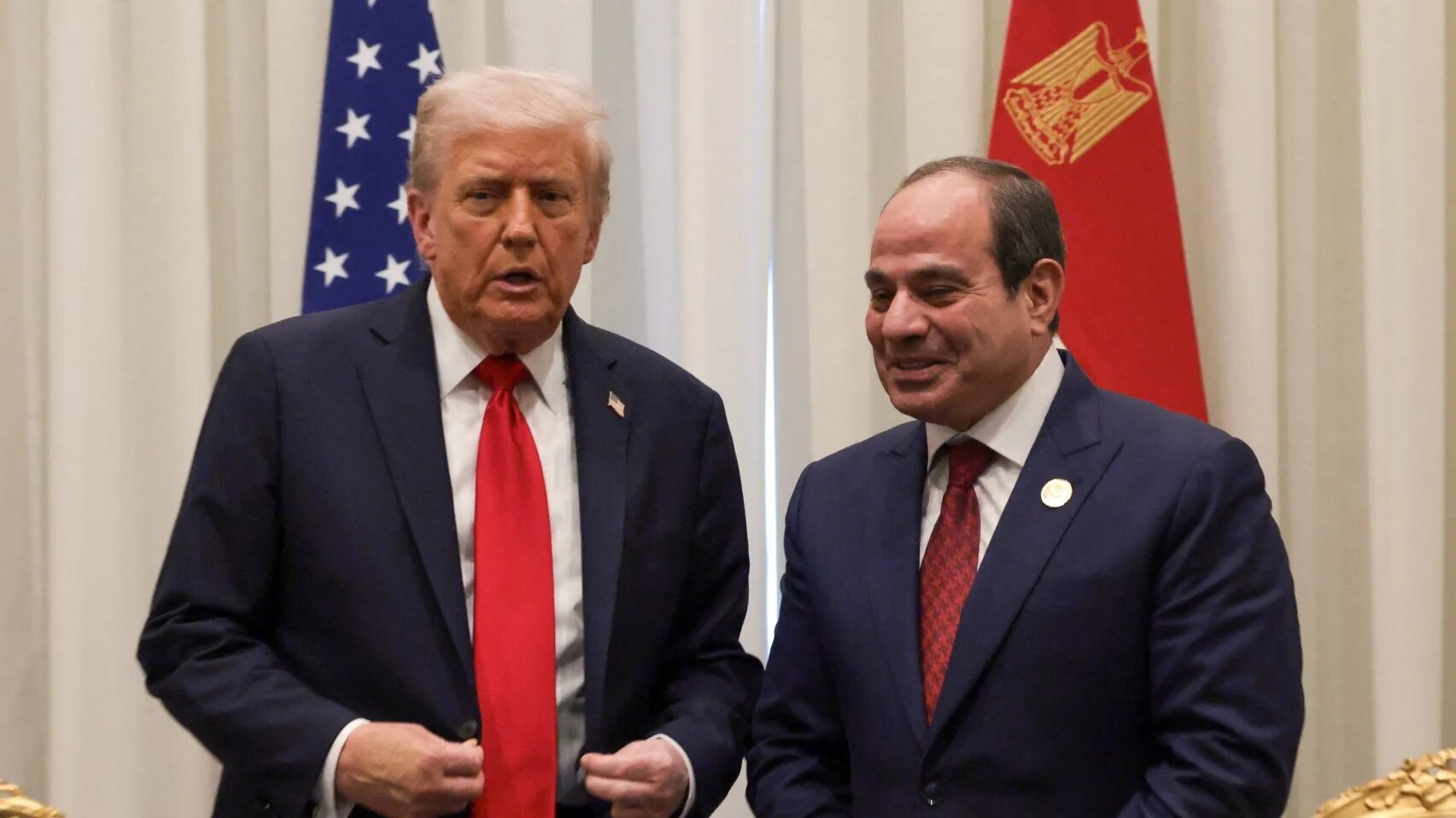 U.S. President Donald Trump and Egyptian President Abdel Fattah el-Sisi meet ahead of a world leaders' summit on ending the Gaza war, amid a U.S.-brokered prisoner-hostage swap and ceasefire deal between Israel and Hamas, in Sharm El-Sheikh, Egypt, October 13, 2025. REUTERS/Evelyn Hockstein