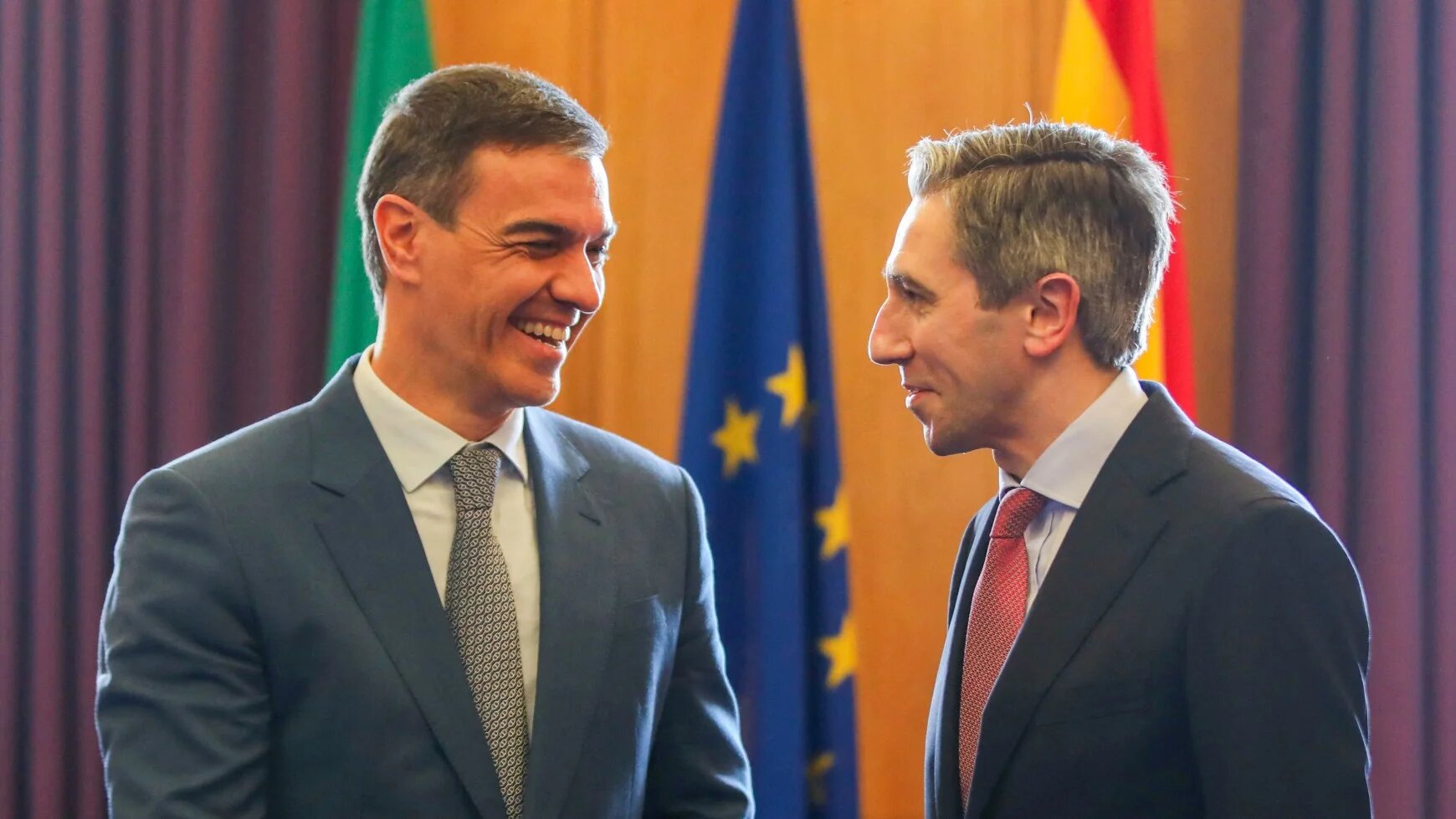 Ireland's Prime Minister Simon Harris (R) shakes hands with Spain's Prime Minister Pedro Sanchez in the Taoiseach's office inside Government Buildings in Dublin on 12 April 2024, during their meeting (Paul Faith/pool/AFP)