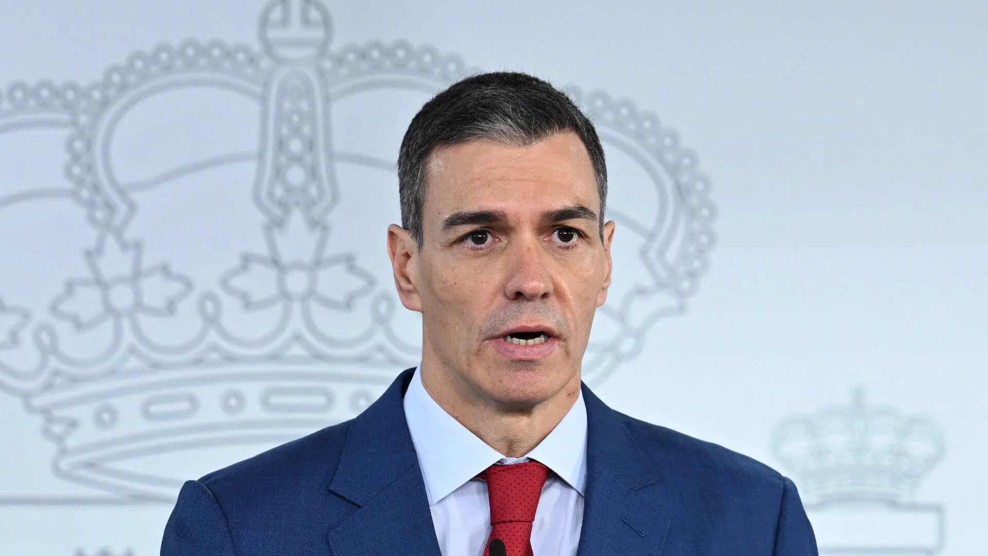 In this handout photo released by La Moncloa on March 4, 2026, Spanish Prime Minister Pedro Sanchez delivers an official statemen in response to U.S. President Donald Trump's remarks, at La Moncloa Palace in Madrid. Spanish PM Pedro Sanchez hit back today at US President Donald Trump's criticisms of Madrid's refusal to let US planes use its bases to attack Iran, saying "no to war". Borja Puig de la Bellacasa / LA MONCLOA / AFP