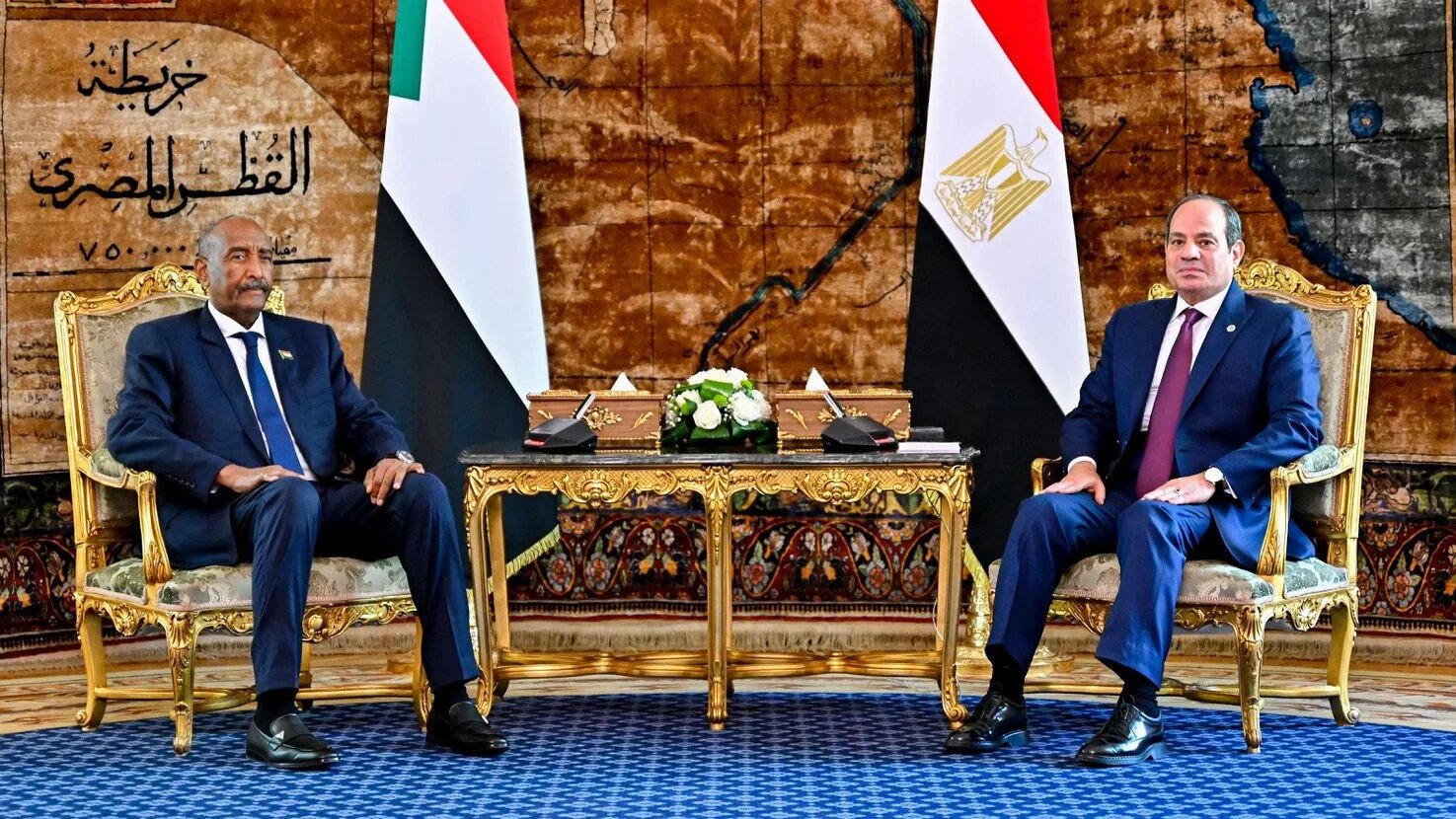 President Abdel Fattah el-Sisi (R) meeting with Sudan's army chief General Abdel Fattah al-Burhan in Cairo on 15 October 2025 (Egyptian presidency)