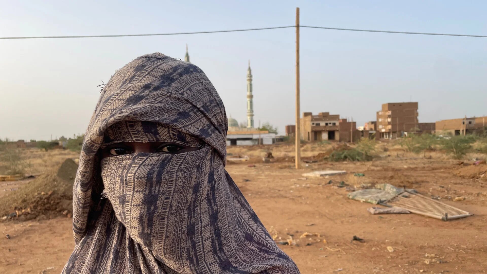 Iptisam Ayyad, a teacher in al-Salha, saw the local cemetery quickly expand whilst the area was under RSF rule (Daniel Hilton/MEE)