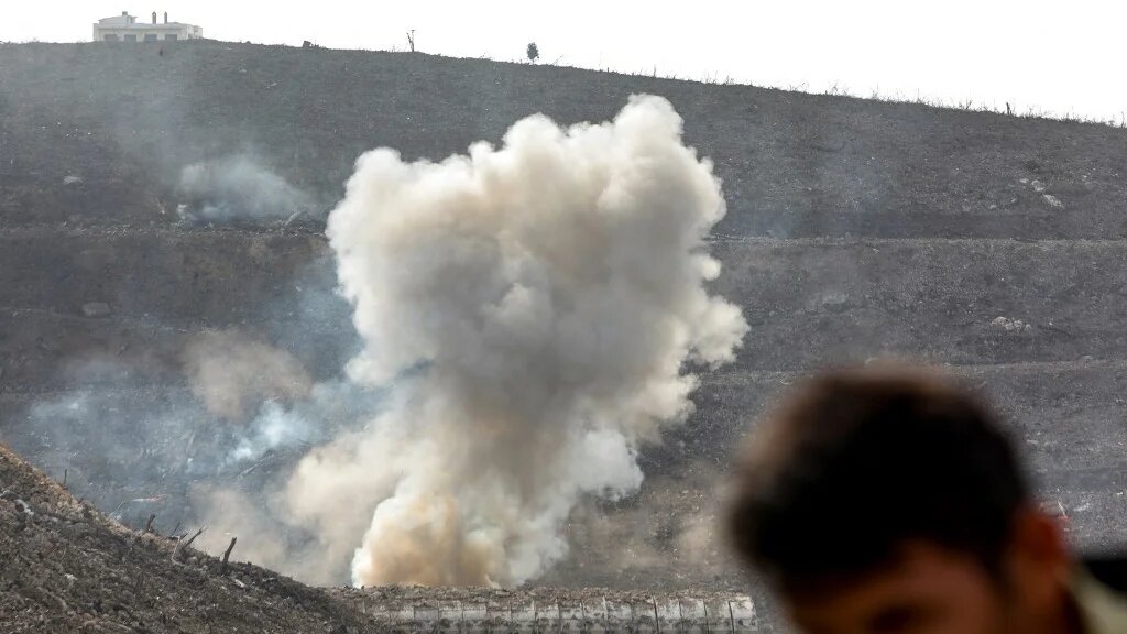 Smoke rises from the site of an army weapons depot hit by Israeli bombardment in western Syria on 16 December 2024 (Bakr Alkasem/AFP)