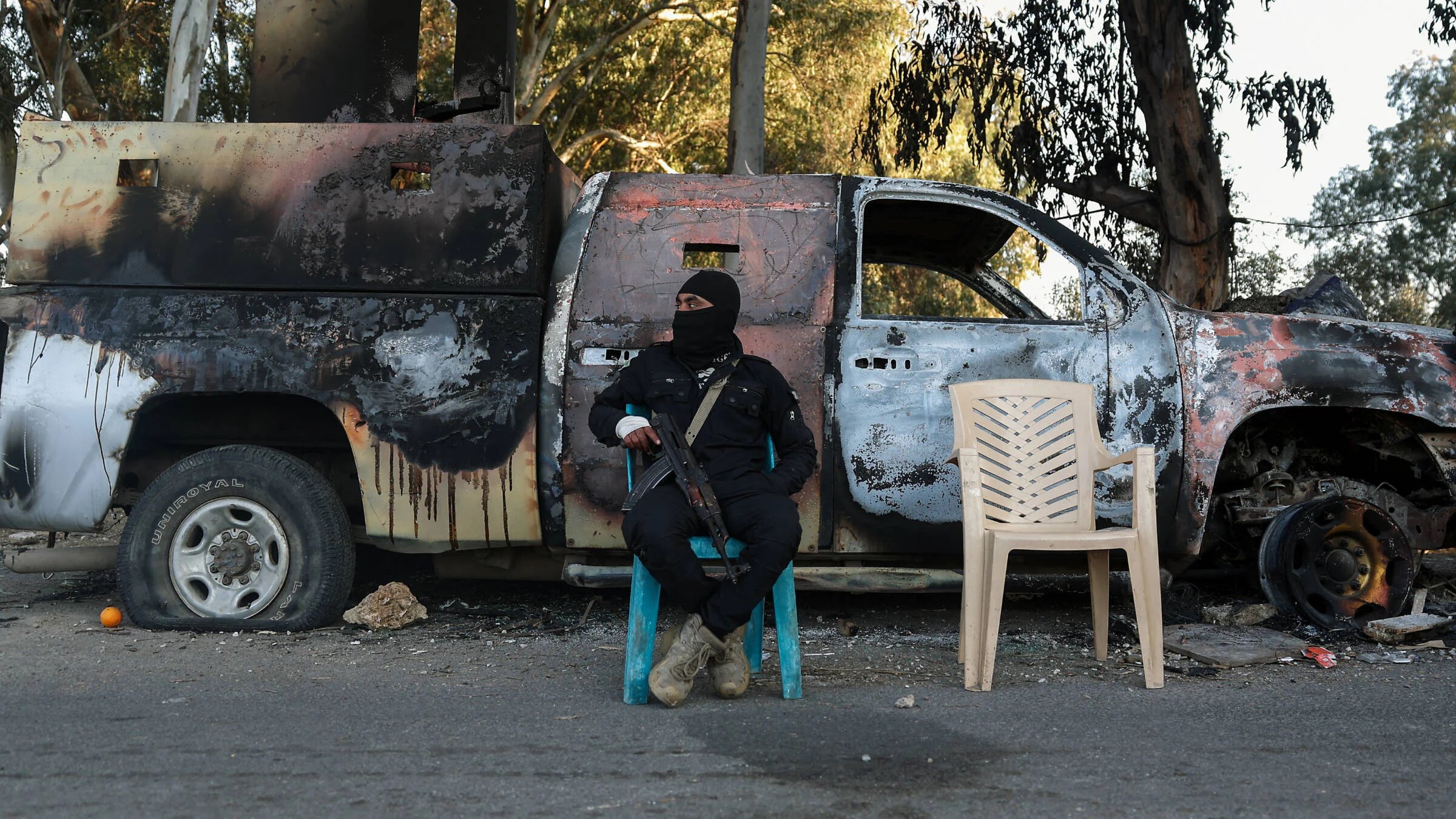 A member of the security forces loyal to the interim Syrian government guards a checkpoint previously held by supporters of deposed president Bashar al-Assad, in the town of Hmeimim, in the coastal province of Latakia, on 11 March 2025 (AFP)