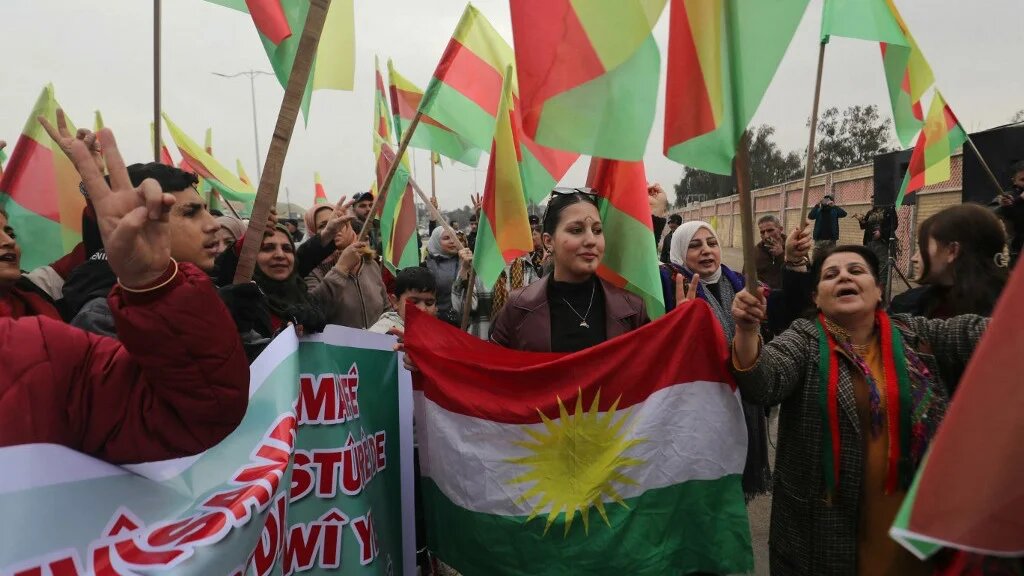 Kurdish women in the north-eastern city of Qamishli gather to show solidarity after a new agreement was brokered between the government and Kurdish forces on 1 February 2026 (AFP)