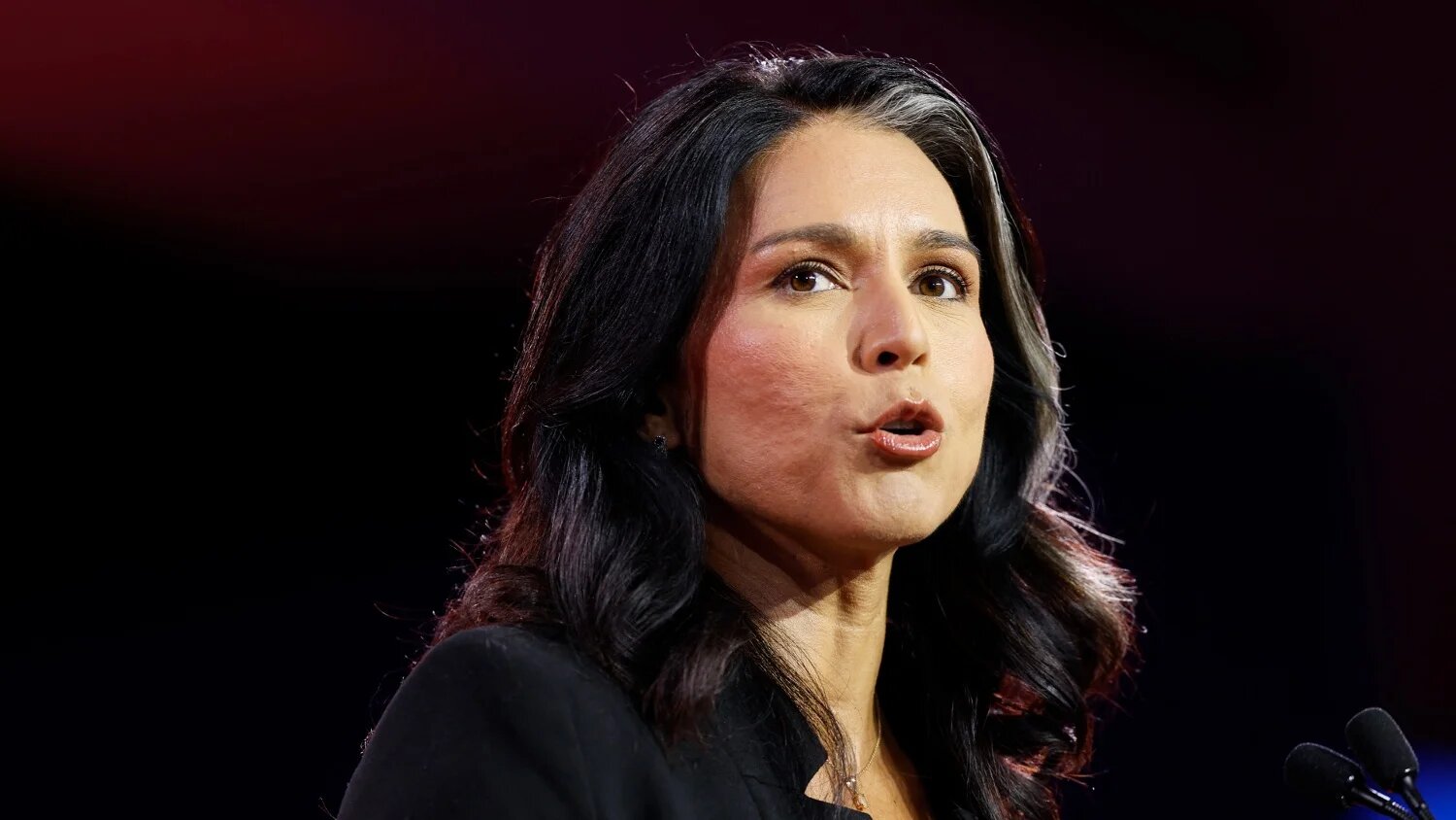 Tulsi Gabbard speaks at the Faith and Freedom Road to Majority conference on 21 June 2024 in Washington (Anna Moneymaker /Getty Images via AFP)
