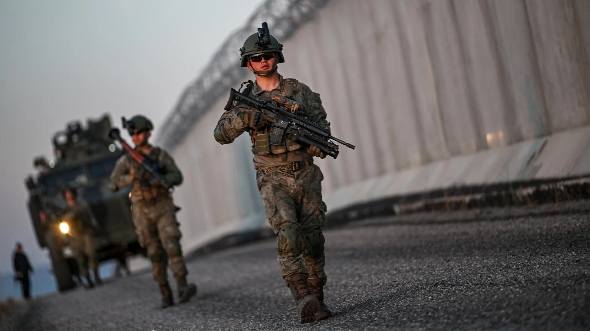 Turkish soldiers patrol near the border wall between Turkey and Iran in the Van Province, eastern Turkey, on 1 November 2024 (Ozan Kose/AFP)
