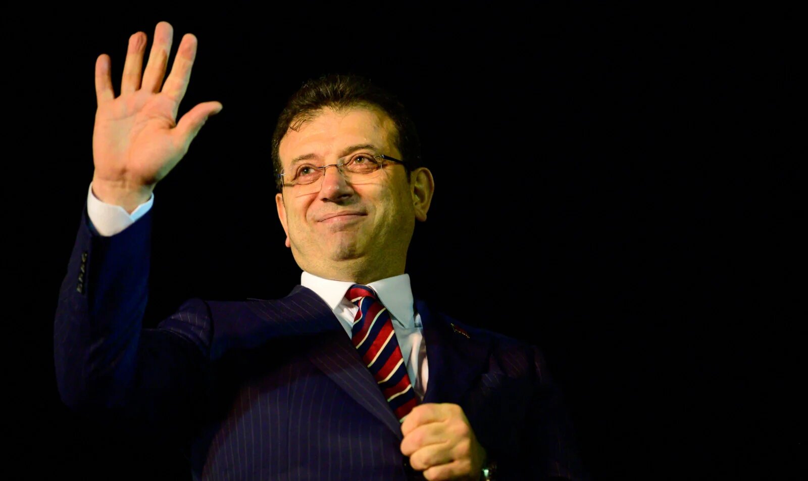 Istanbul Mayor Ekrem Imamoglu greets his supporters in Istanbul in December 2022 (AFP)